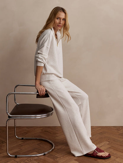 Front view of Varley The Wide Leg Pant 28 Ivory Marl, relaxed wide-leg silhouette in marl fabric.